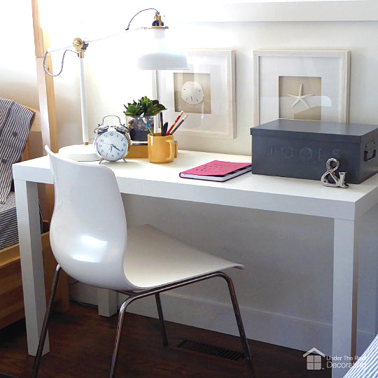 How to hang two pictures side-by-side above a desk